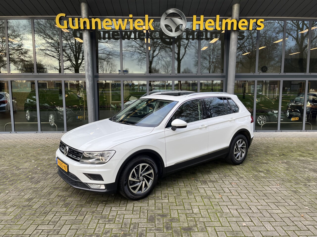 Volkswagen Tiguan - 1.4 TSI Comfortline | CRUISE CONTROL | CLIMATE CONTROL | NAVIGATIE | CARPLAY | PDC - AutoWereld.nl