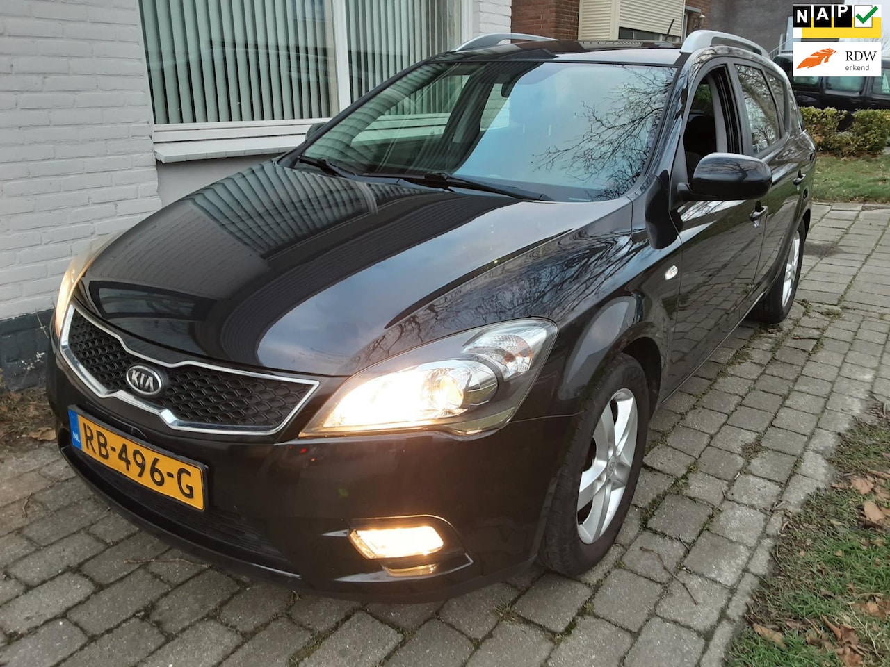 Kia Cee'd Sporty Wagon - 1.4 CVVT X-ecutive 1.4 CVVT X-ecutive - AutoWereld.nl