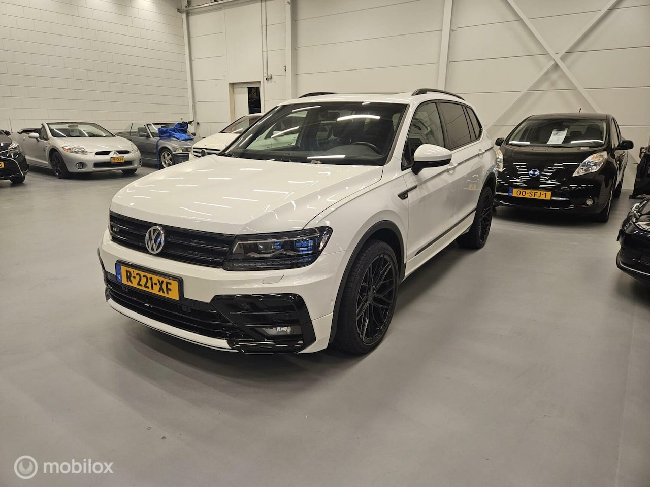 Volkswagen Tiguan - 2.0 R Line TSI 4Motion Highline - AutoWereld.nl