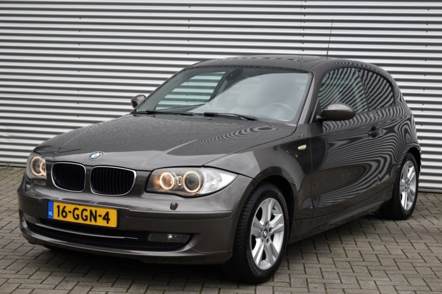 BMW 1-serie - 118I BSN LINE / LEDER / ECC / PDC / SCHUIF/KANTELDAK / XENON - AutoWereld.nl