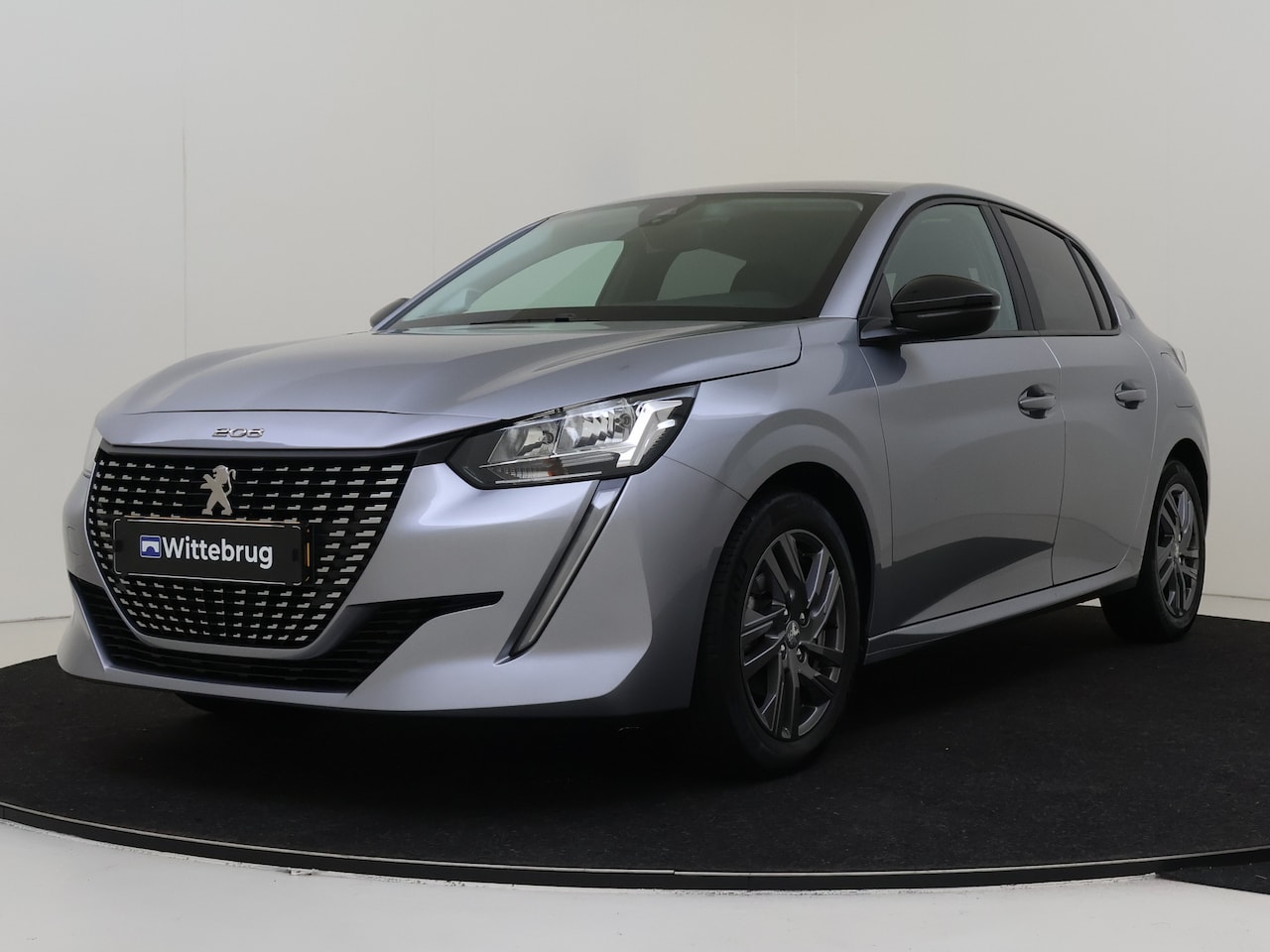 Peugeot 208 - 1.2 75PK Active Pack | Getinte ruiten | Parkeerhulp | Airco | DAB+ | - AutoWereld.nl