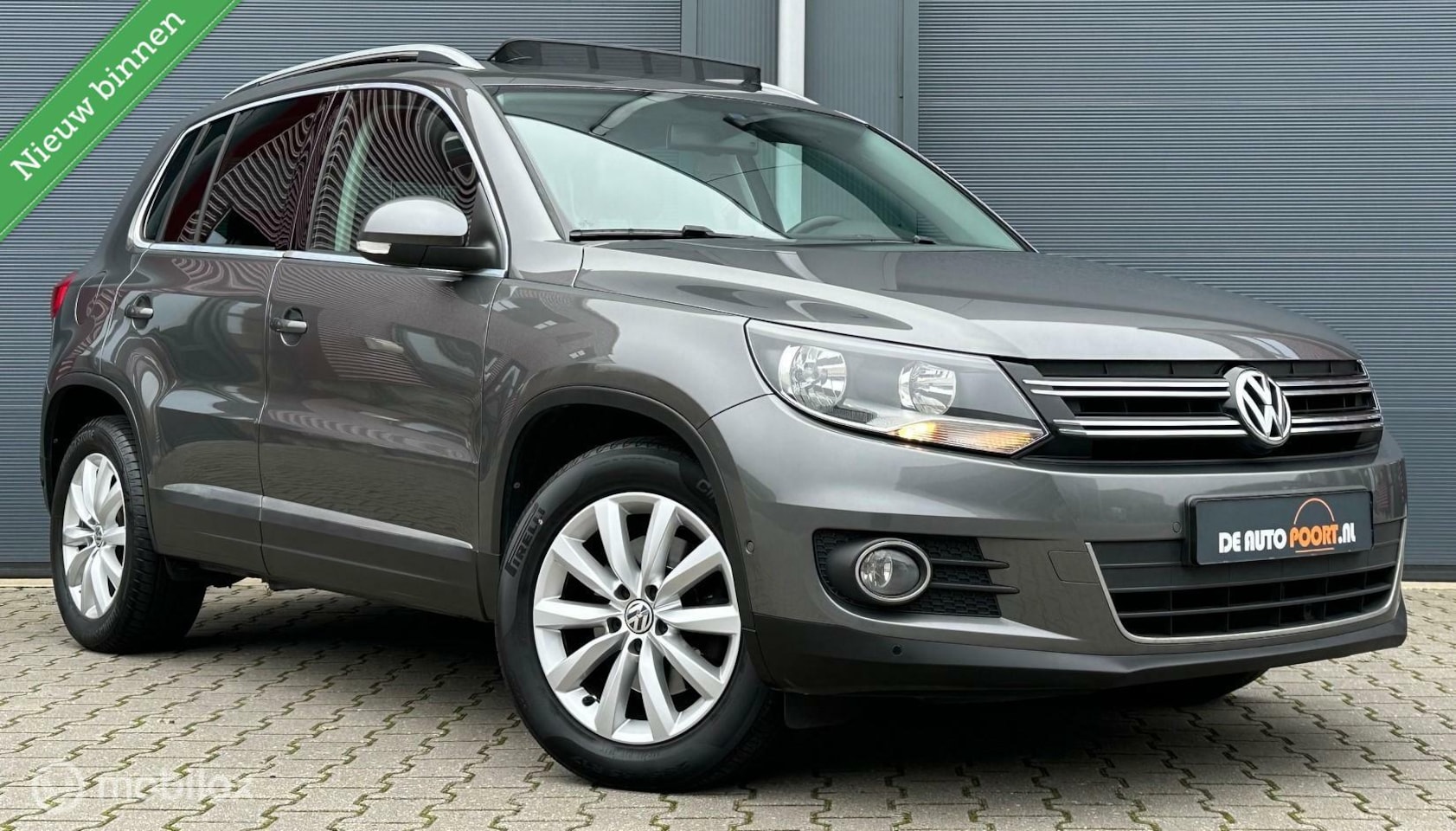 Volkswagen Tiguan - 1.4 TSI Sport&Style DSG Pano.dak/Trekhaak/Clima - AutoWereld.nl