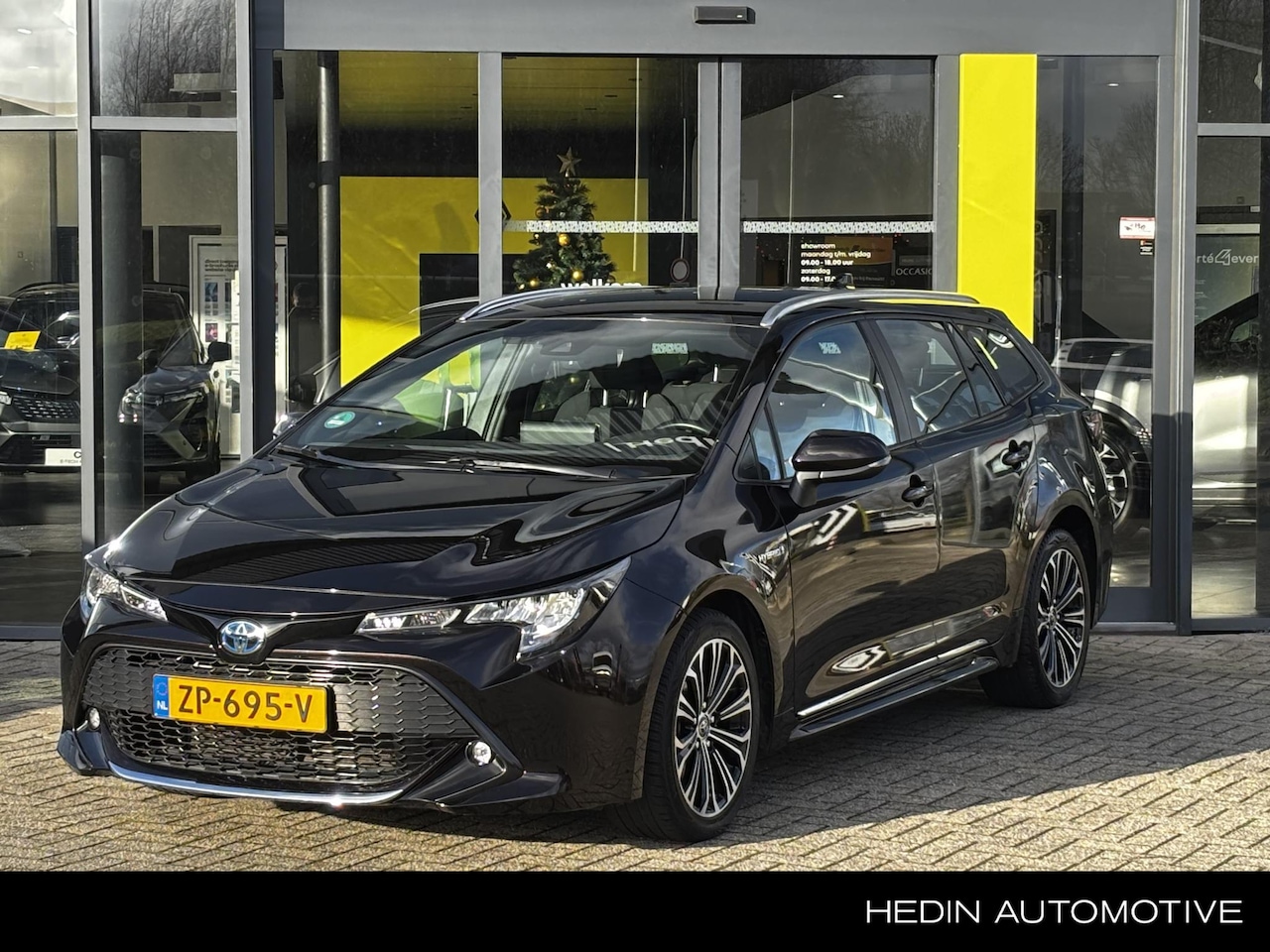 Toyota Corolla Touring Sports - 1.8 Hybrid First Edition Achteruitrijcamera | Lichtmetalen velgen | Climate Control | Crui - AutoWereld.nl