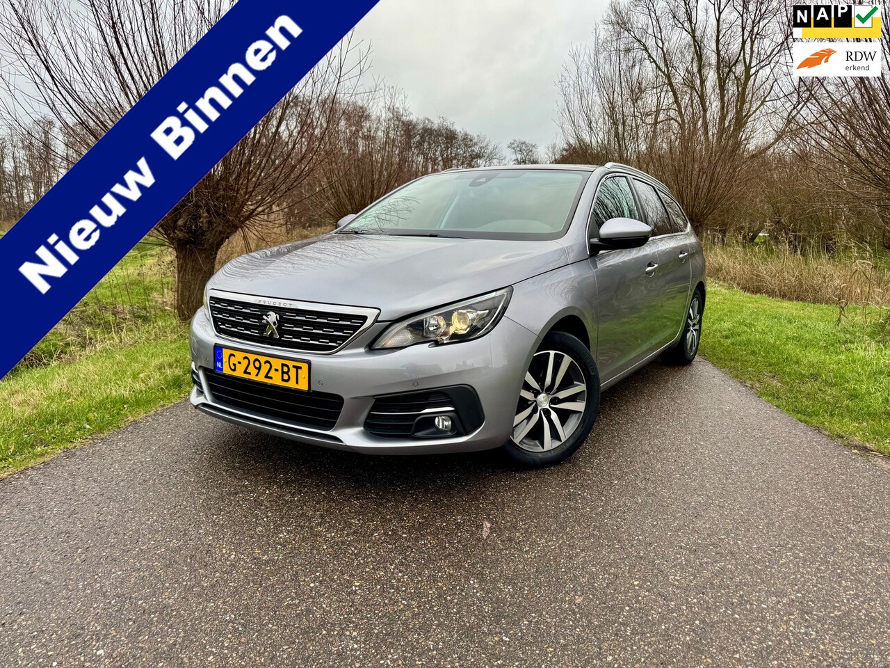 Peugeot 308 SW - 1.2 PureTech Blue Lease Premium / 1ste Eigenaar / Navigatie / Panorama dak / Lm Velgen / C - AutoWereld.nl