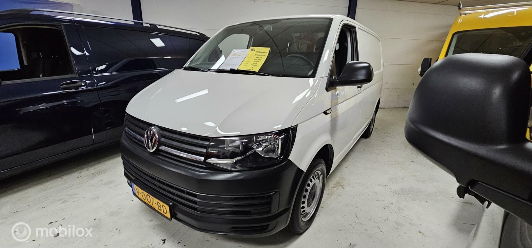 Volkswagen Transporter - 2.0 TDI Euro 6 L1H1 47000KM NAP! - AutoWereld.nl