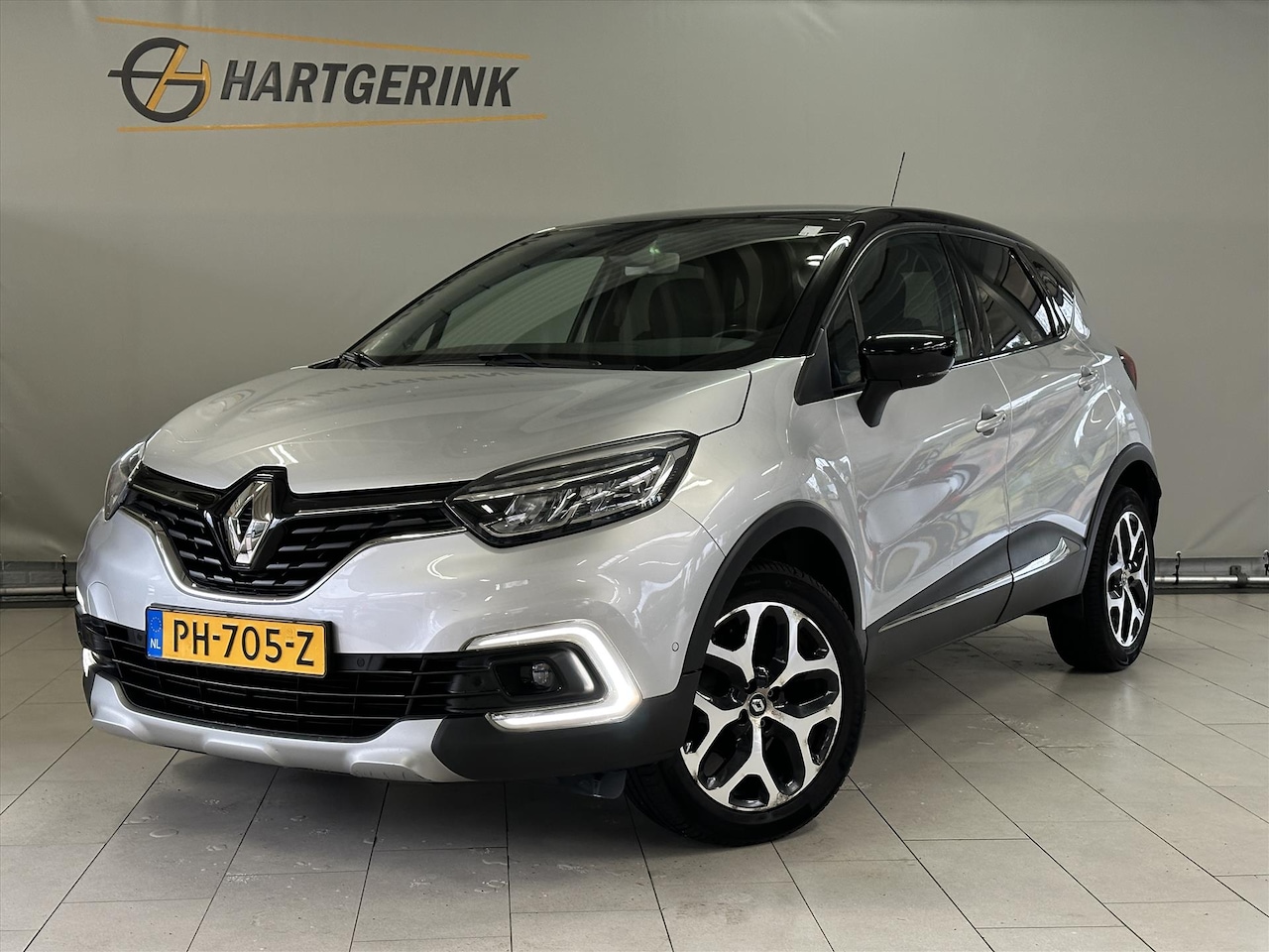 Renault Captur - 90PK Intens* Airco / Navi / Camera / PDC / LMV - AutoWereld.nl