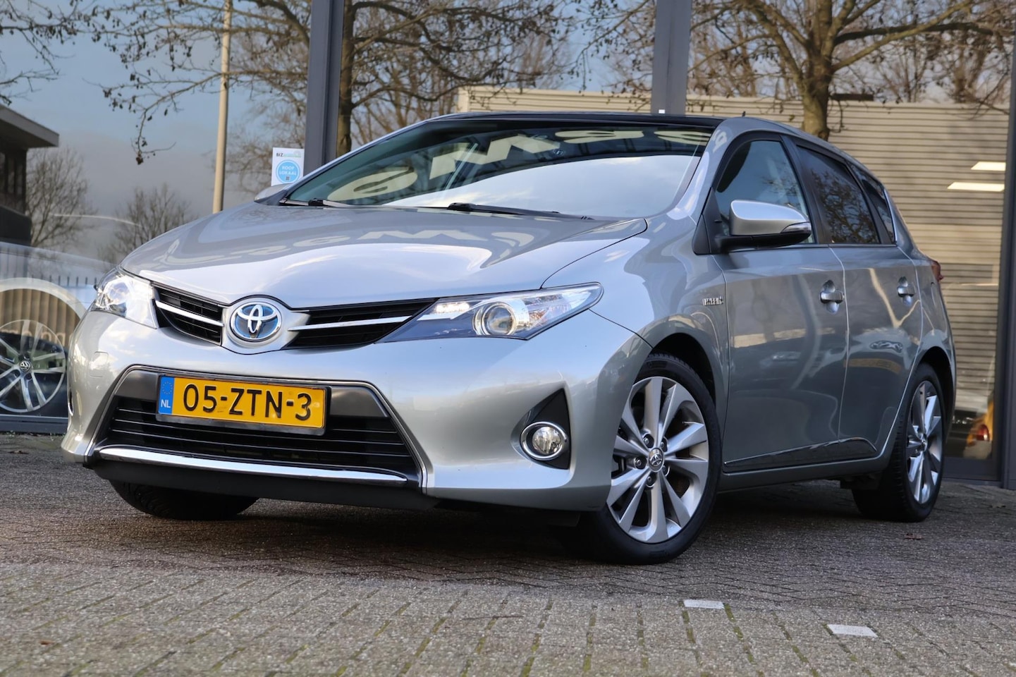 Toyota Auris - 1.8 Hybrid Lease|Pano|Navi|Cruise|Camera| - AutoWereld.nl