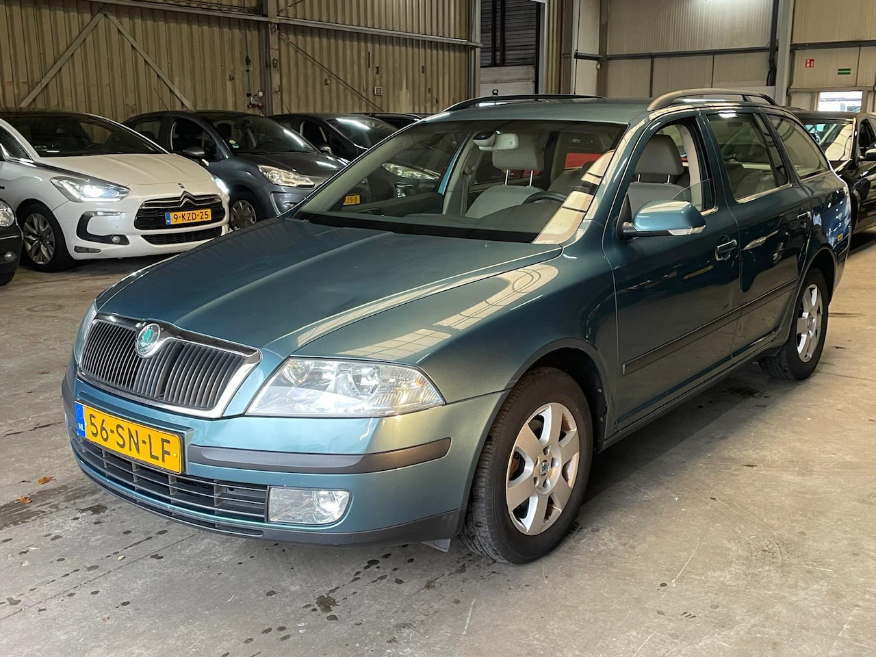 Skoda Octavia Combi - 2.0 FSI Elegance Automaat - AutoWereld.nl