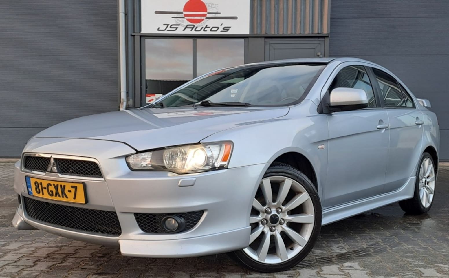 Mitsubishi Lancer - 1.8 Xenon Leder Navi Full Optie 2de Eigenaar - AutoWereld.nl