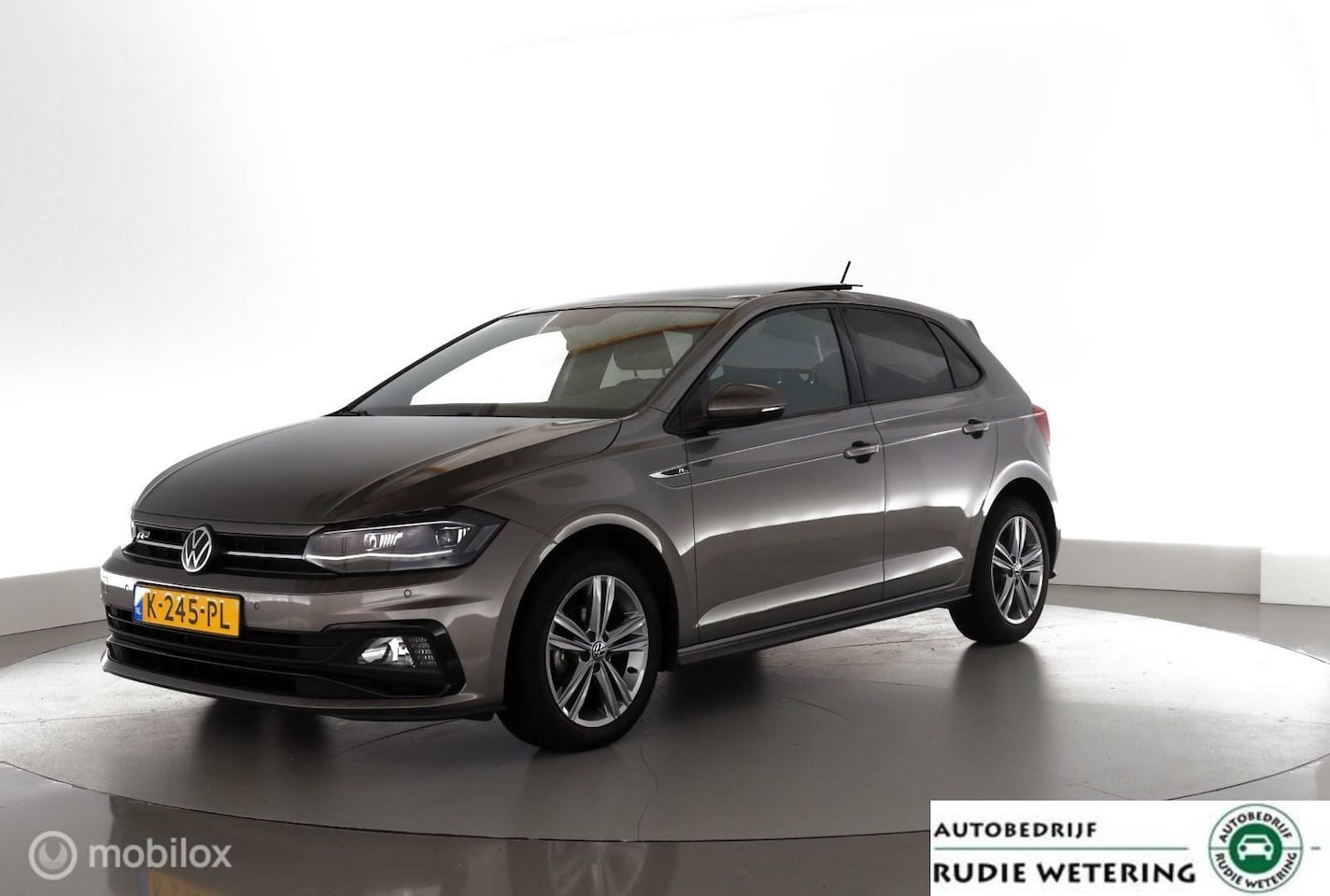 Volkswagen Polo - 1.0 TSI Automaat Highline R-Line panorama|virtueelcockpiT|led|nav|dab|pdc|ecc|lmv16 - AutoWereld.nl