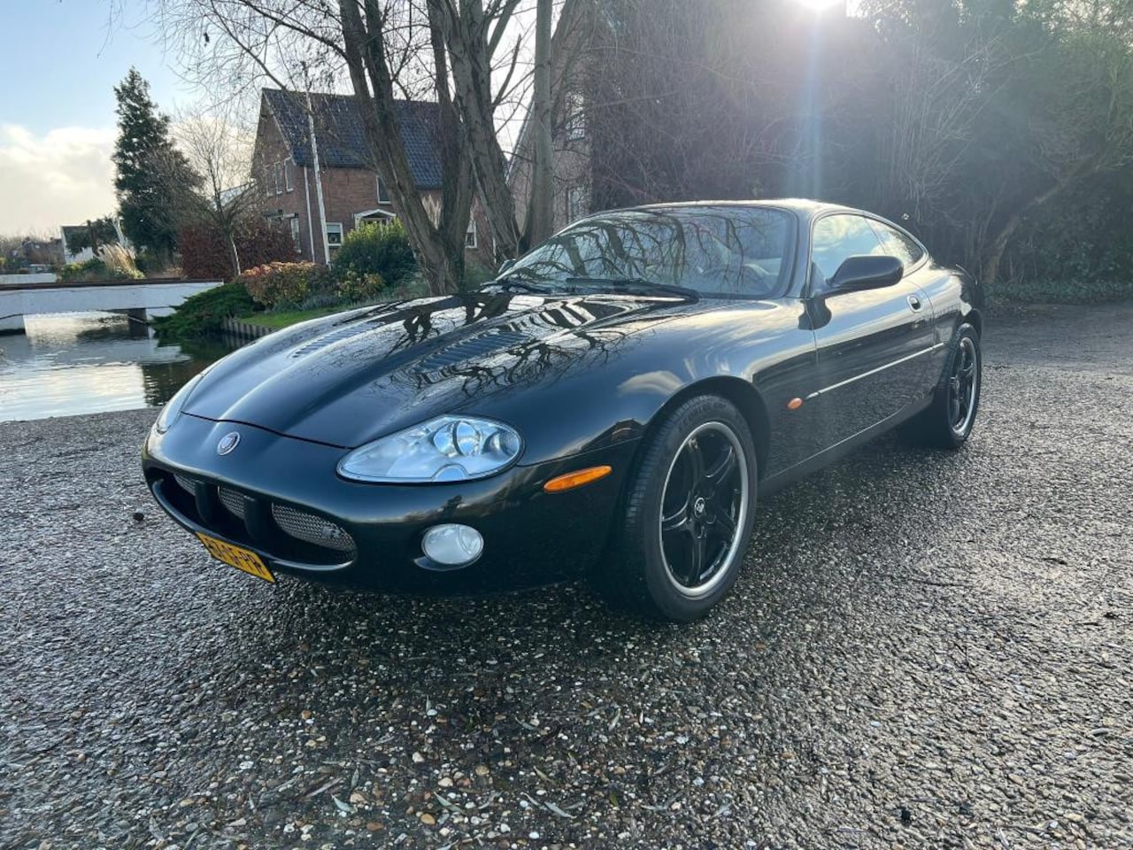 Jaguar XKR - 4.0 V8 Coupé super charger - AutoWereld.nl