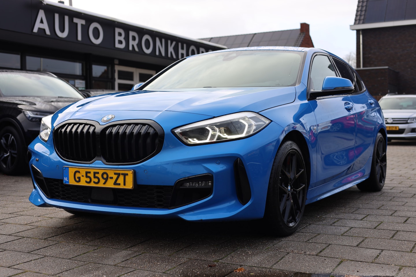 BMW 1-serie - 118i M-SPORT I AUTOMAAT I CAMERA I 1e EIG! - AutoWereld.nl