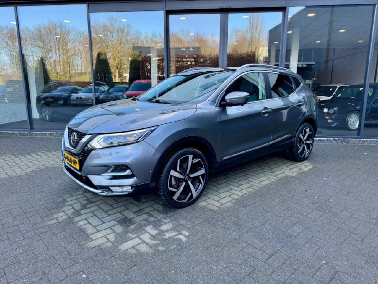 Nissan Qashqai - 1.3 DIG-T TEKNA,LED,Half Leer,Carplay,Pano,BLIS,Cam 360,Keyless - AutoWereld.nl