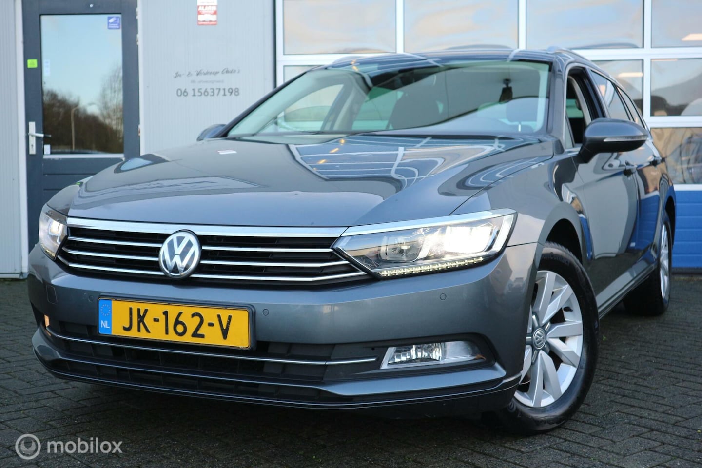 Volkswagen Passat Variant - 1.6 TDI Comfortline ECC/PDC/NAVI - AutoWereld.nl