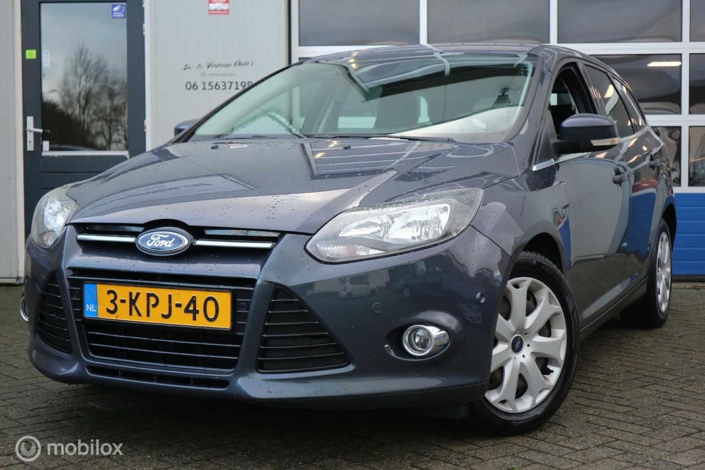 Ford Focus Wagon - 1.6 TDCI Titanium ECC/NAVI/2-PDC/NAP - AutoWereld.nl