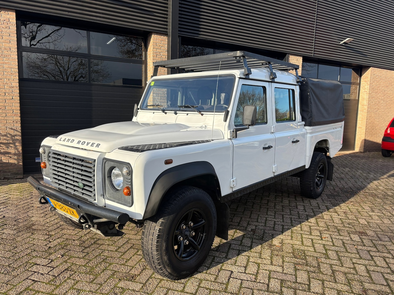 Land Rover Defender 130 - 2.2 D 130" S Crew Cab - AutoWereld.nl