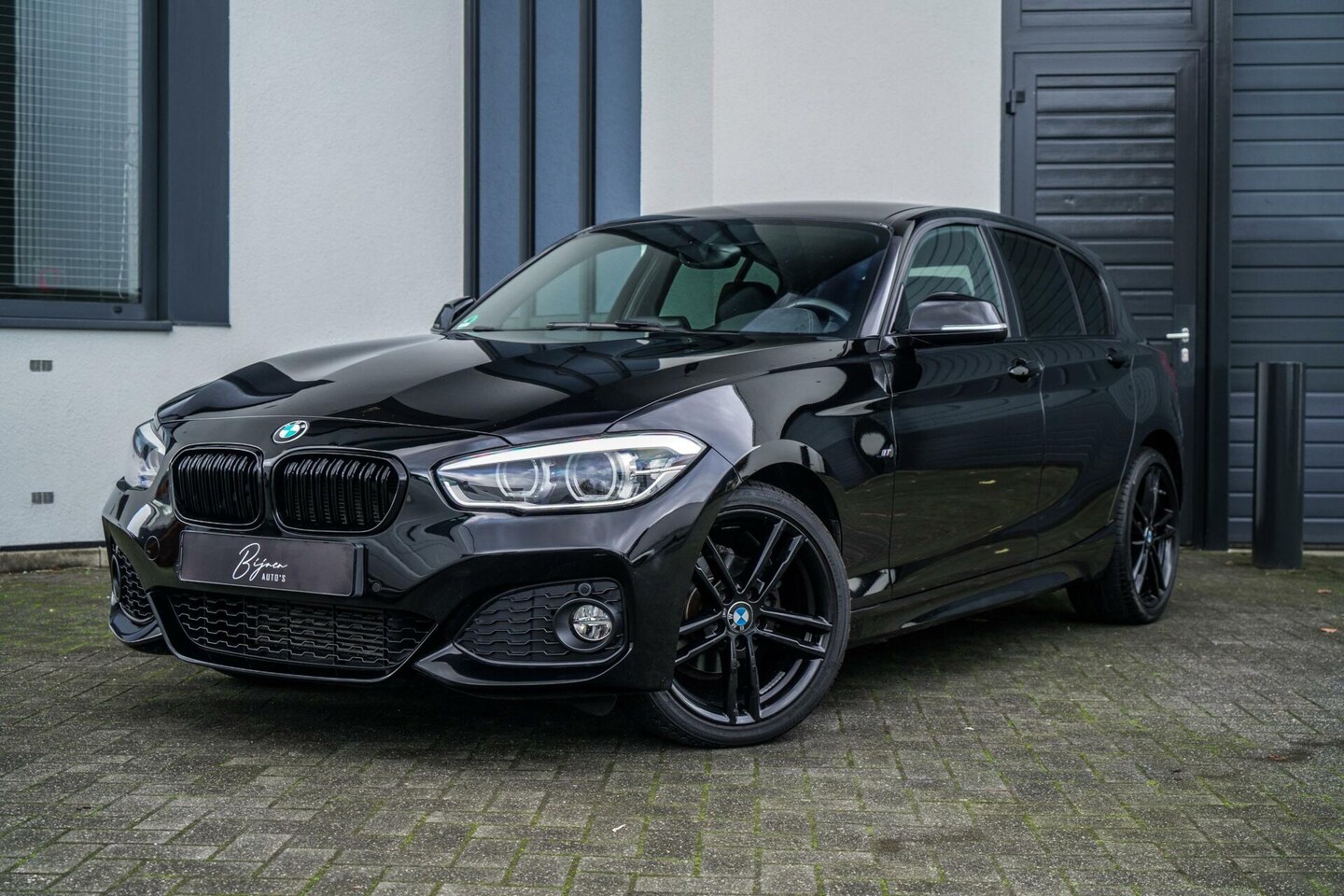 BMW 1-serie - 116i M Sport Edition LEER / NAVI / PDC - AutoWereld.nl