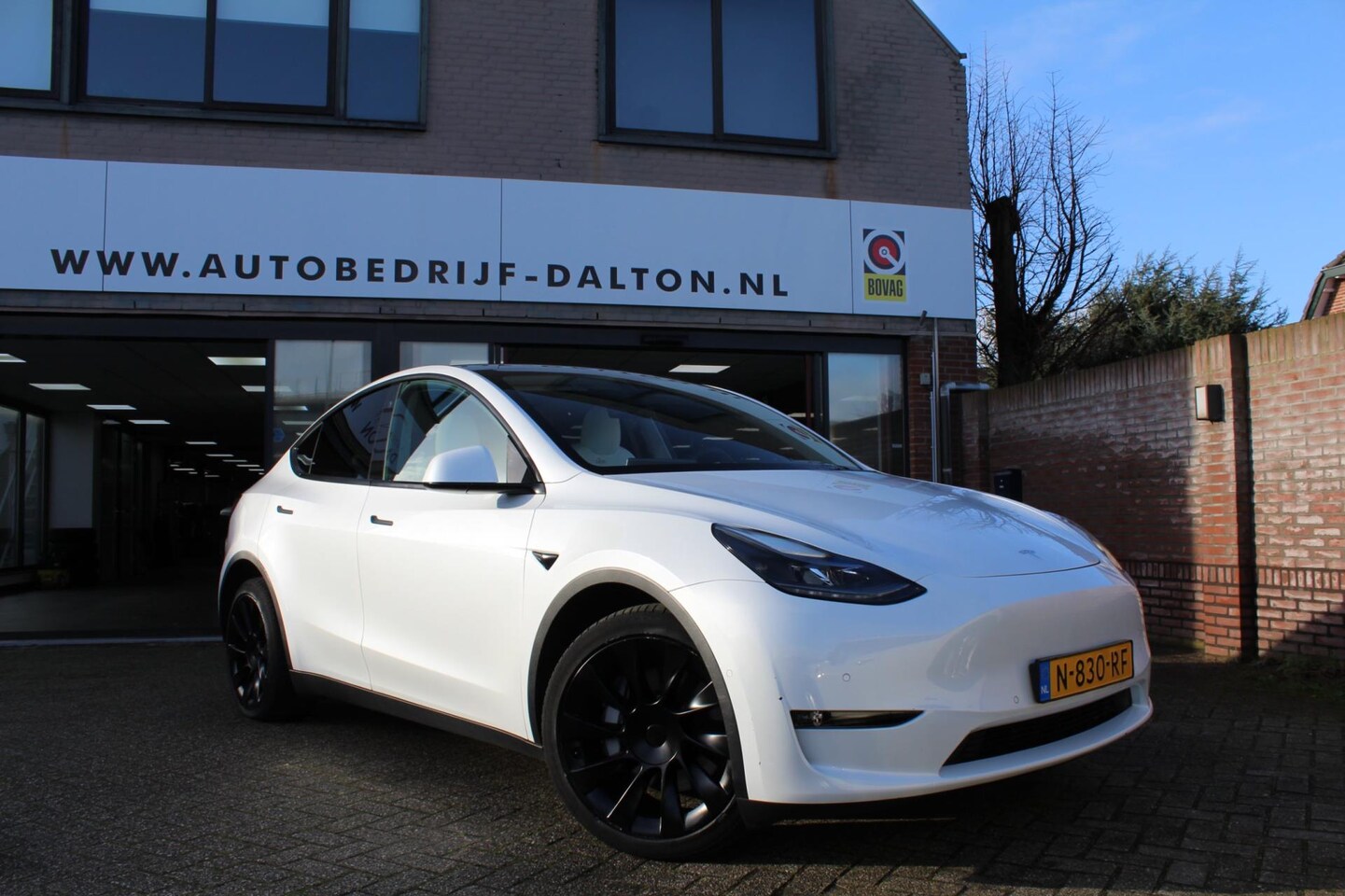 Tesla Model Y - Long Range AWD 75 kWh WIT LEER / AUTOPILOT / PANODAK / INCL. BTW - AutoWereld.nl