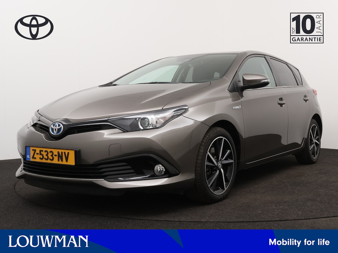 Toyota Auris - 1.8 Hybrid Dynamic Ultimate Limited | Trekhaak | 17" LM velgen | Navigatie | - AutoWereld.nl