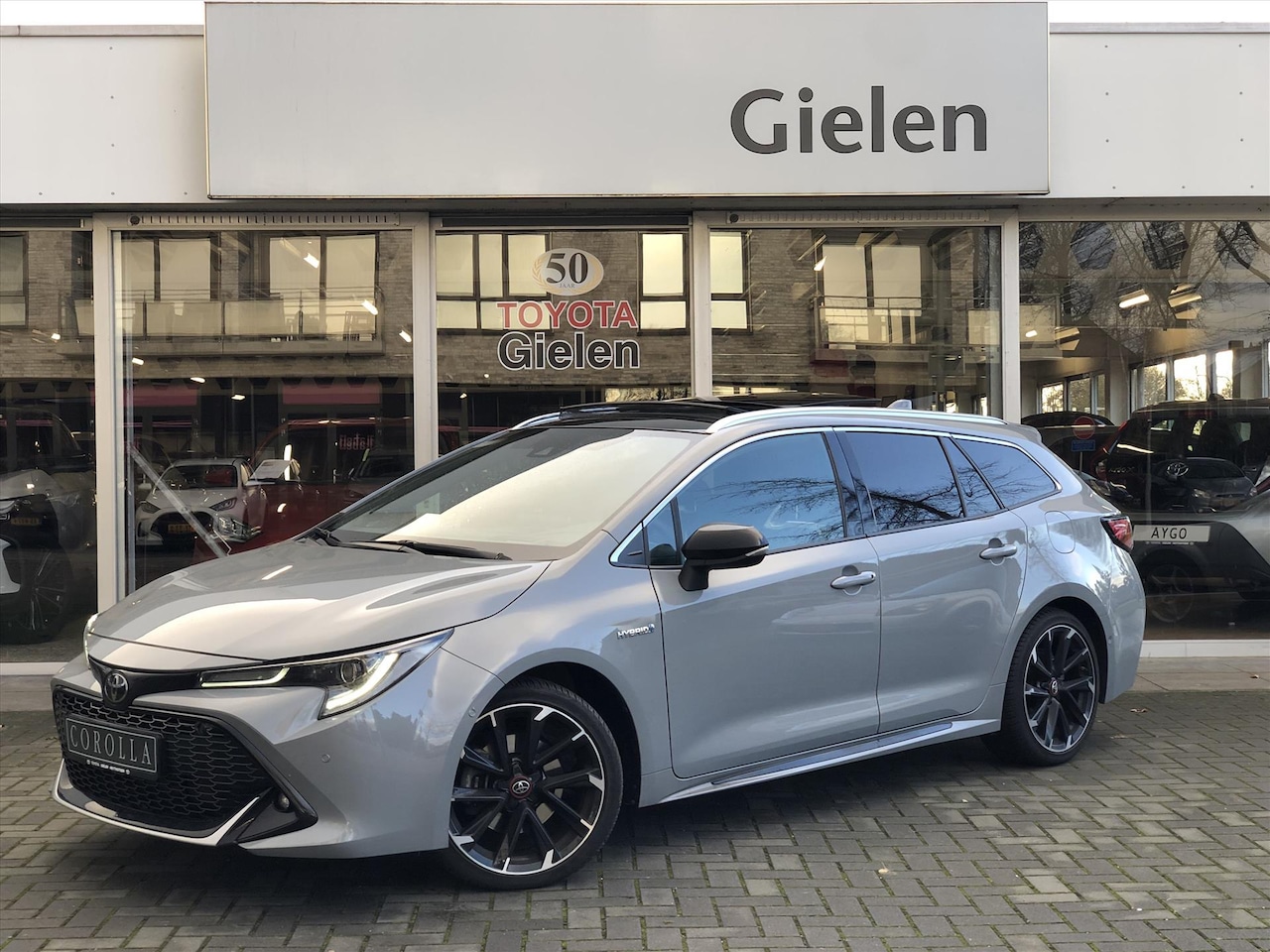 Toyota Corolla Touring Sports - 2.0 Hybrid GR Sport Plus | Panoramadak, JBL, Stoel + Stuurverwarming, Elektrische achterkl - AutoWereld.nl