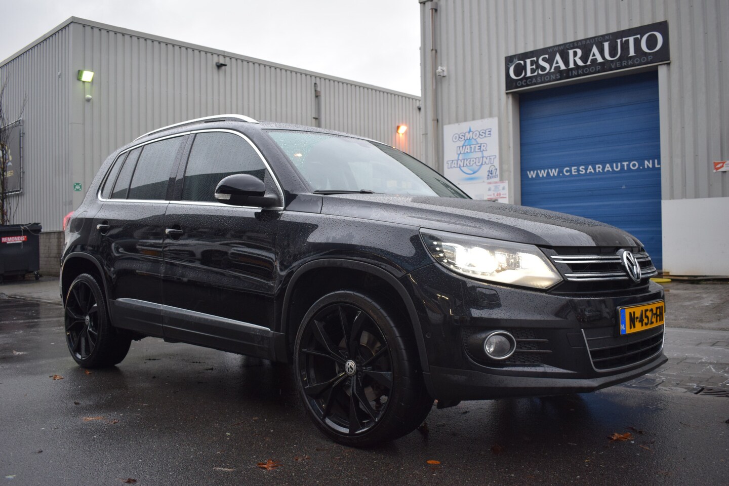 Volkswagen Tiguan - 2.0 TSI SPORT&STYLE 4MOTION AUTOMAAT / PANO - AutoWereld.nl