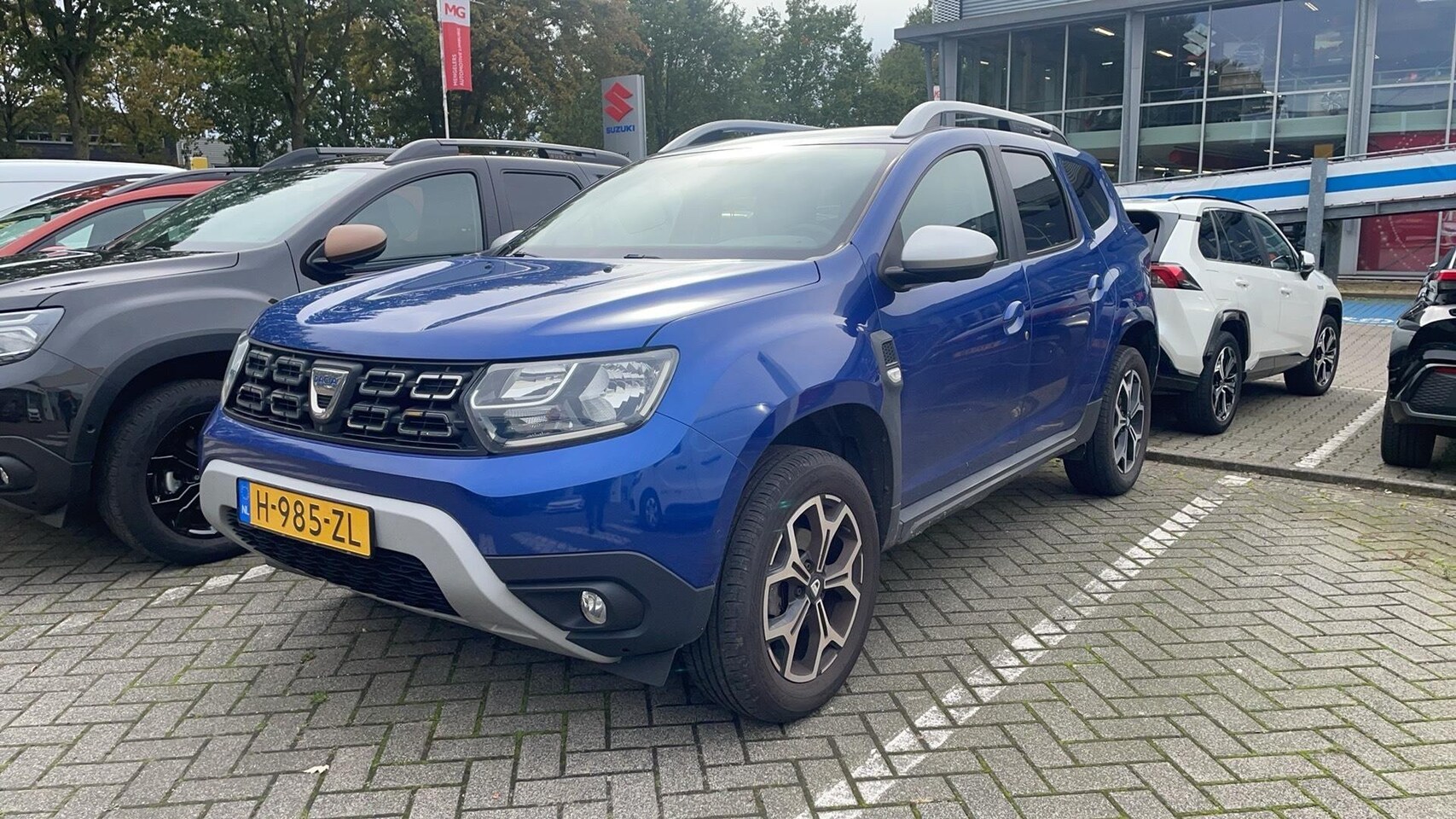 Dacia Duster - 1.0 TCe Bi-Fuel Prestige 1e eig., Nav, Cruise, Airco, Trekhaak - AutoWereld.nl