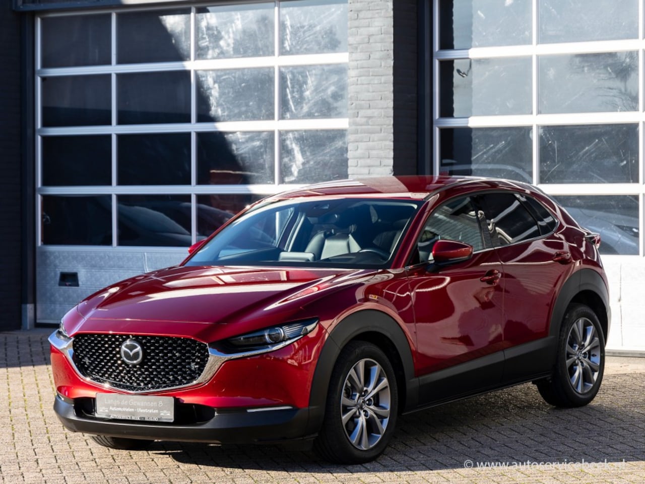 Mazda CX-30 - 2.0 SkyActiv-G Luxury, leder. navi, camera met 33600 kilometer - AutoWereld.nl