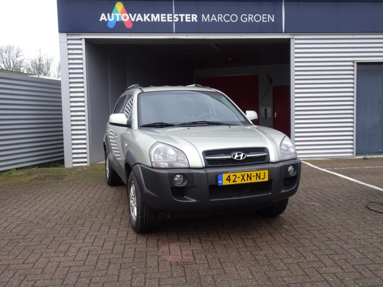 Hyundai Tucson - V6 2.7 4 WD ,trekhaak 1600k 2.7i V6 4WD Style - AutoWereld.nl