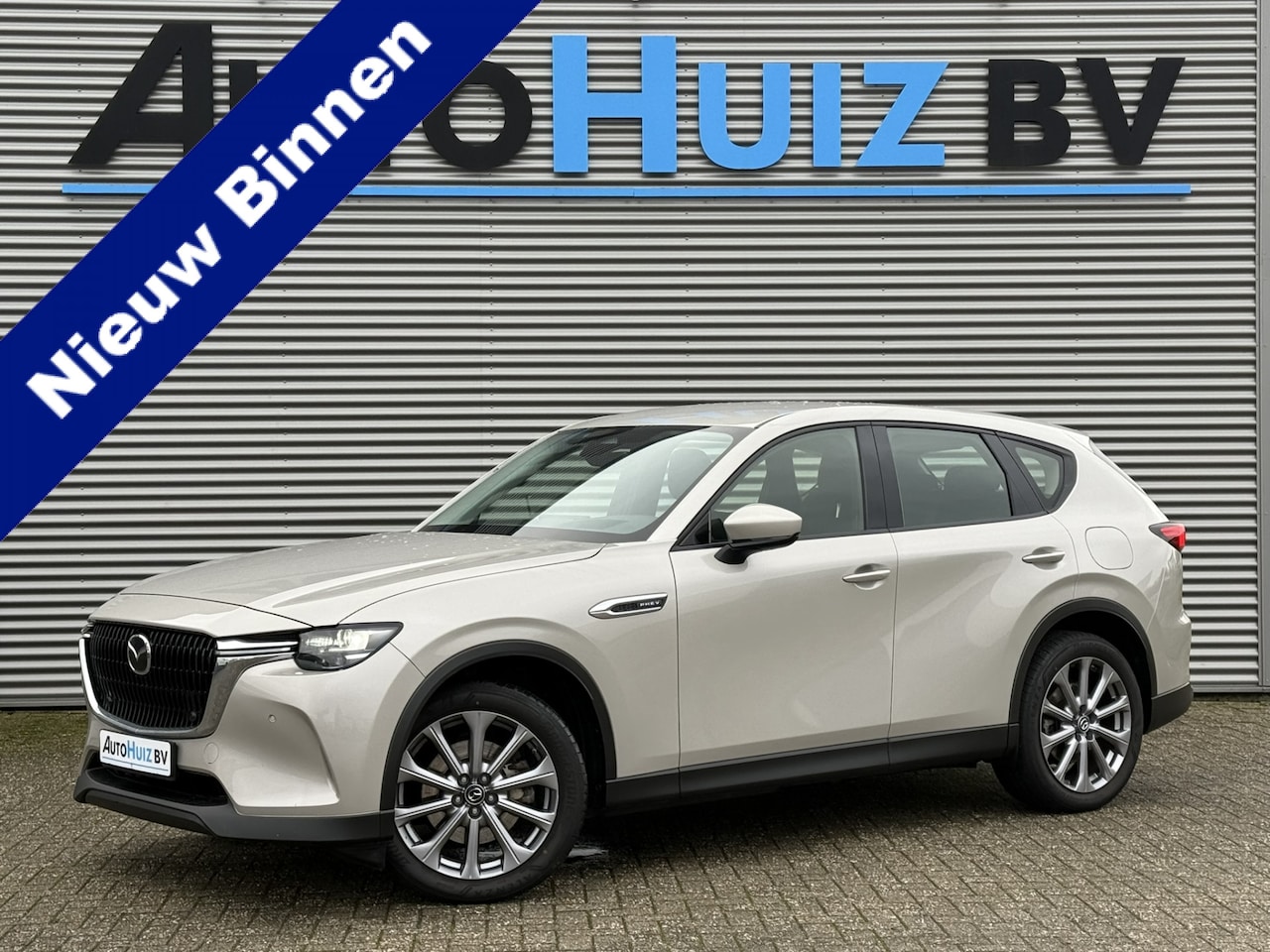 Mazda CX-60 - 2.5 e-SkyActiv PHEV Exclusive-Line Wegklapbare trekhaak Stuurverwarming Achteruitrijcamera - AutoWereld.nl