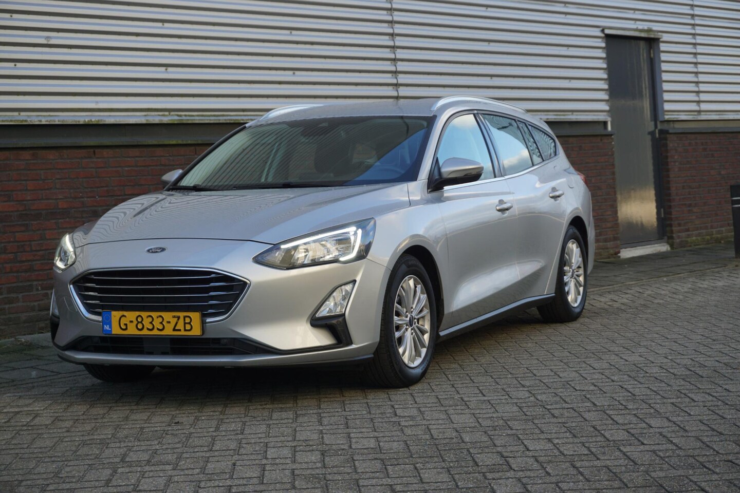 Ford Focus Wagon - 1.0 EcoBoost 125PK Trekhaak Titanium Business Dealeronderhouden. - AutoWereld.nl