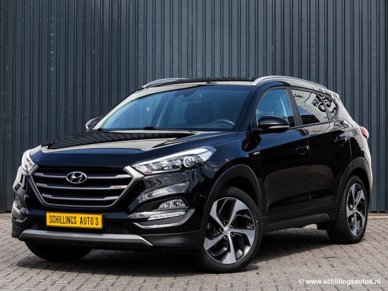 Hyundai Tucson - 1.6 T-GDI PREM. 4WD 170PK Automaat Leer Navi Camera 53.000km - AutoWereld.nl