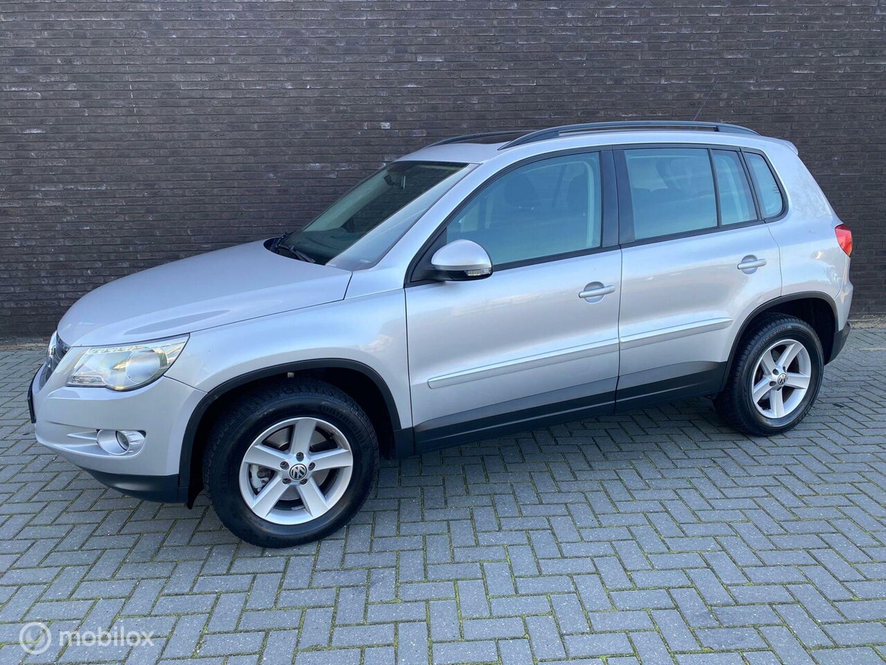 Volkswagen Tiguan - 1.4 TSI Sport&Style 4Motion|Panorama|Airco - AutoWereld.nl