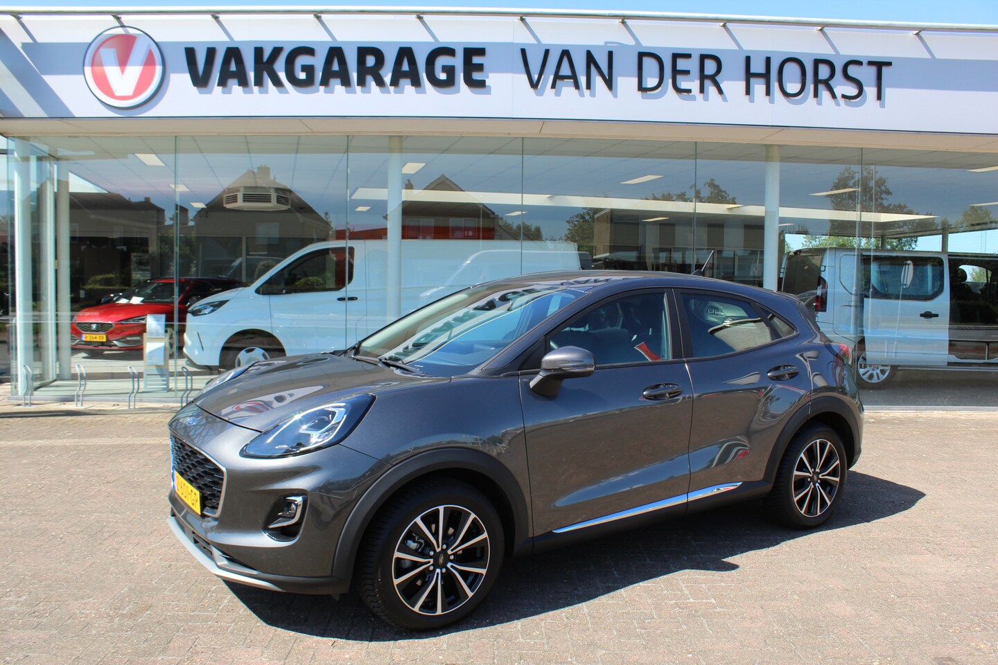 Ford Puma - 1.0-125pk EcoBoost Hybrid Titanium. Garantie t/m 21-05-2027 ! Slechts 14.750km ! Volautm. - AutoWereld.nl