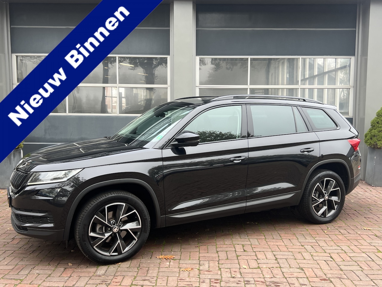 Skoda Kodiaq - 1.5 TSI Style Business 7p. Automaat,Clima,Trekhaak,19Inch Bom Vol - AutoWereld.nl