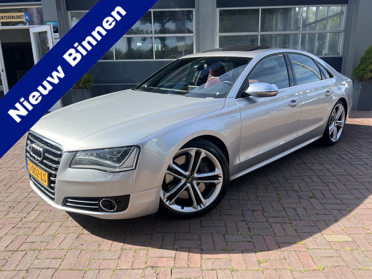 Audi A8 - 4.0 TFSI S8 quattro 2014 km 144.000 V8 Turbo 540PK+ Stage1 21” B&O Pano Led Rood Leer TV - AutoWereld.nl