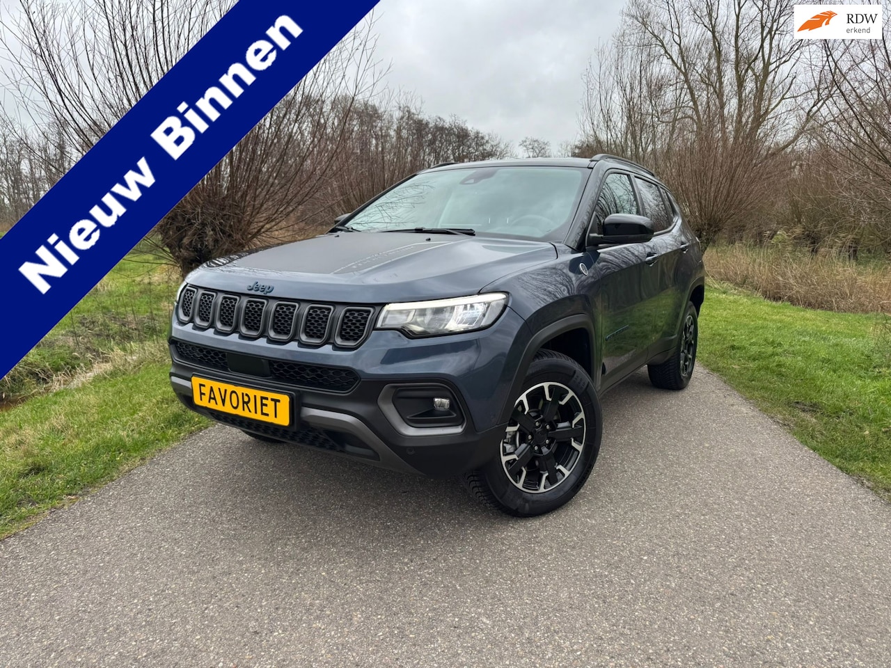 Jeep Compass - 4xe 240 Plug-in Hybrid Electric Trailhawk / BTW Auto / Airco / Navi / Camera / Leder / 2 L - AutoWereld.nl