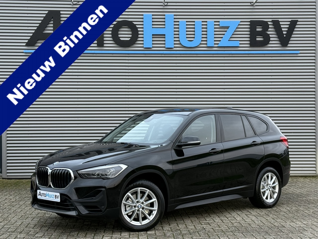 BMW X1 - sDrive18i Executive LED Navigatie Climate Control Cruise Control PDC Stoelverwarming - AutoWereld.nl