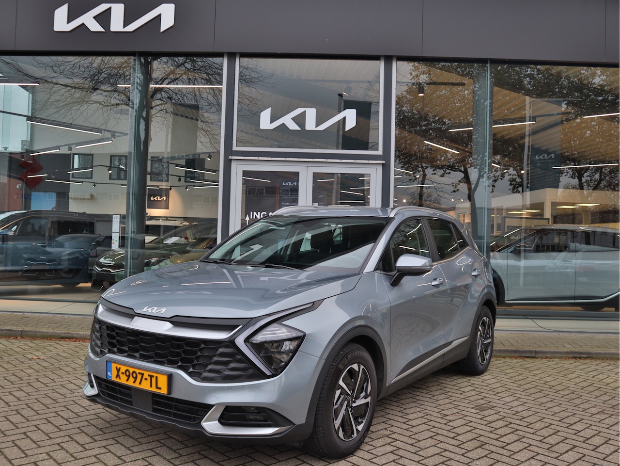 Kia Sportage - 1.6 T-GDi MHEV DynamicLine Navi+BT+Cam Cr. Control ECC-Airco 17''LMV 7 Jr. Garantie - AutoWereld.nl