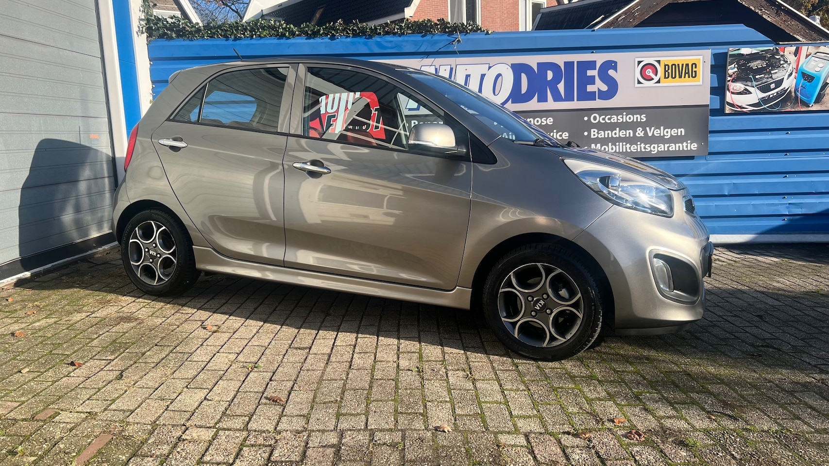 Kia Picanto - 1.0 CVVT ISG Design Edition Navi - Leder - 1e eigenaar - AutoWereld.nl