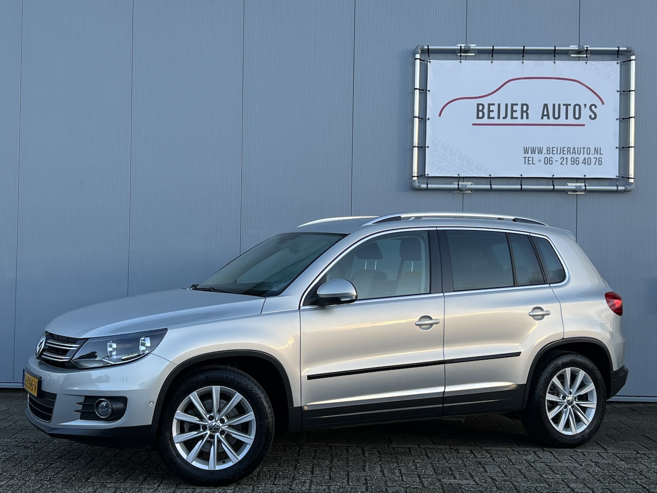 Volkswagen Tiguan - 1.4 TSI Sport&Style Trekhaak/Navi/Cruise. - AutoWereld.nl