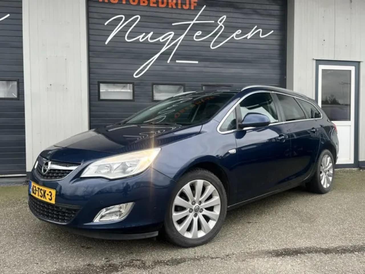 Opel Astra Sports Tourer - 1.4 Turbo Cosmo+Stuurverw+Navi+Leer - AutoWereld.nl