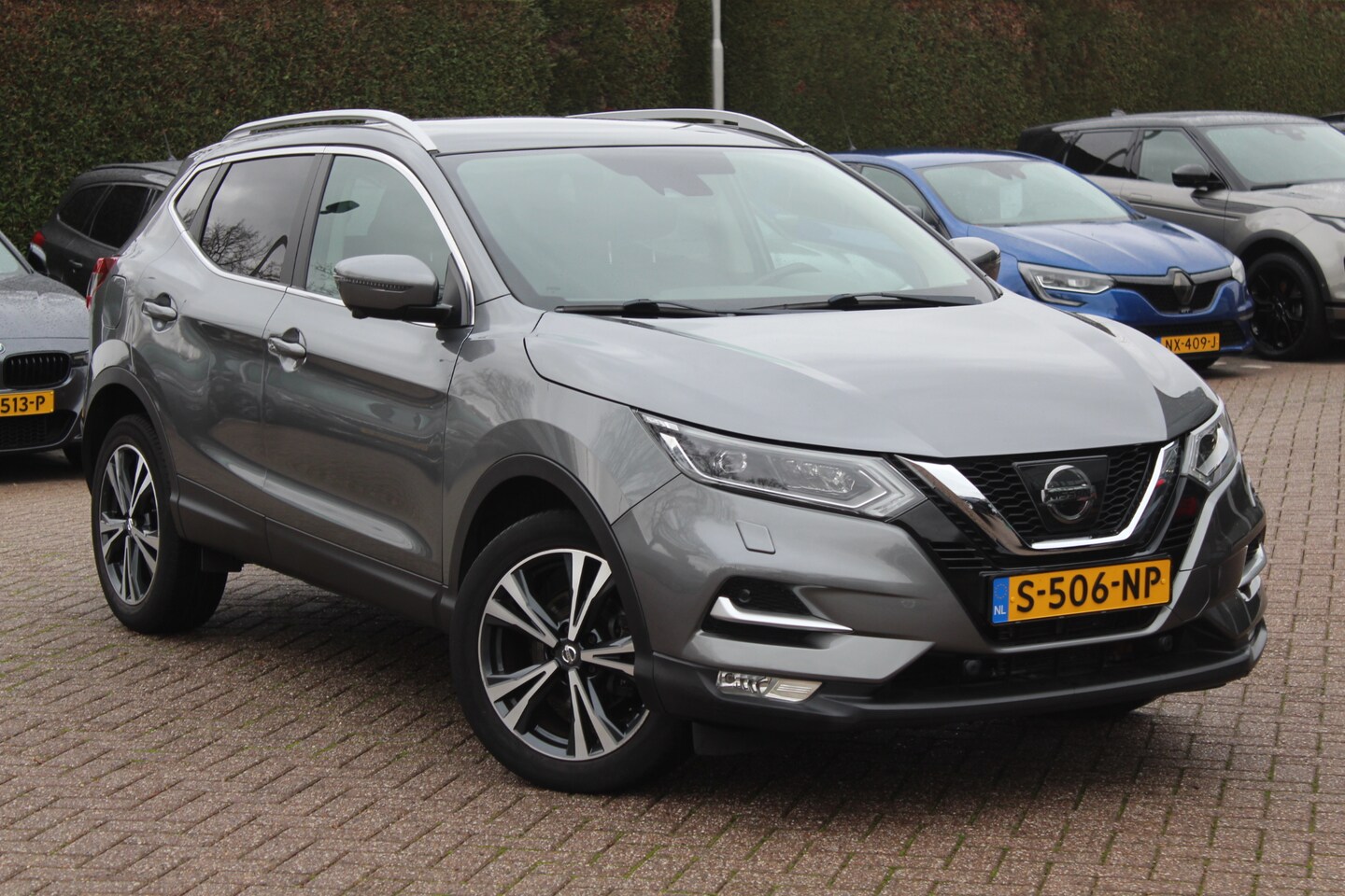 Nissan Qashqai - 1.2 Tekna + / Panoramadak / 360Camera / Keyless / 18'' / Navigatie / DAB / Stoelverwarming - AutoWereld.nl