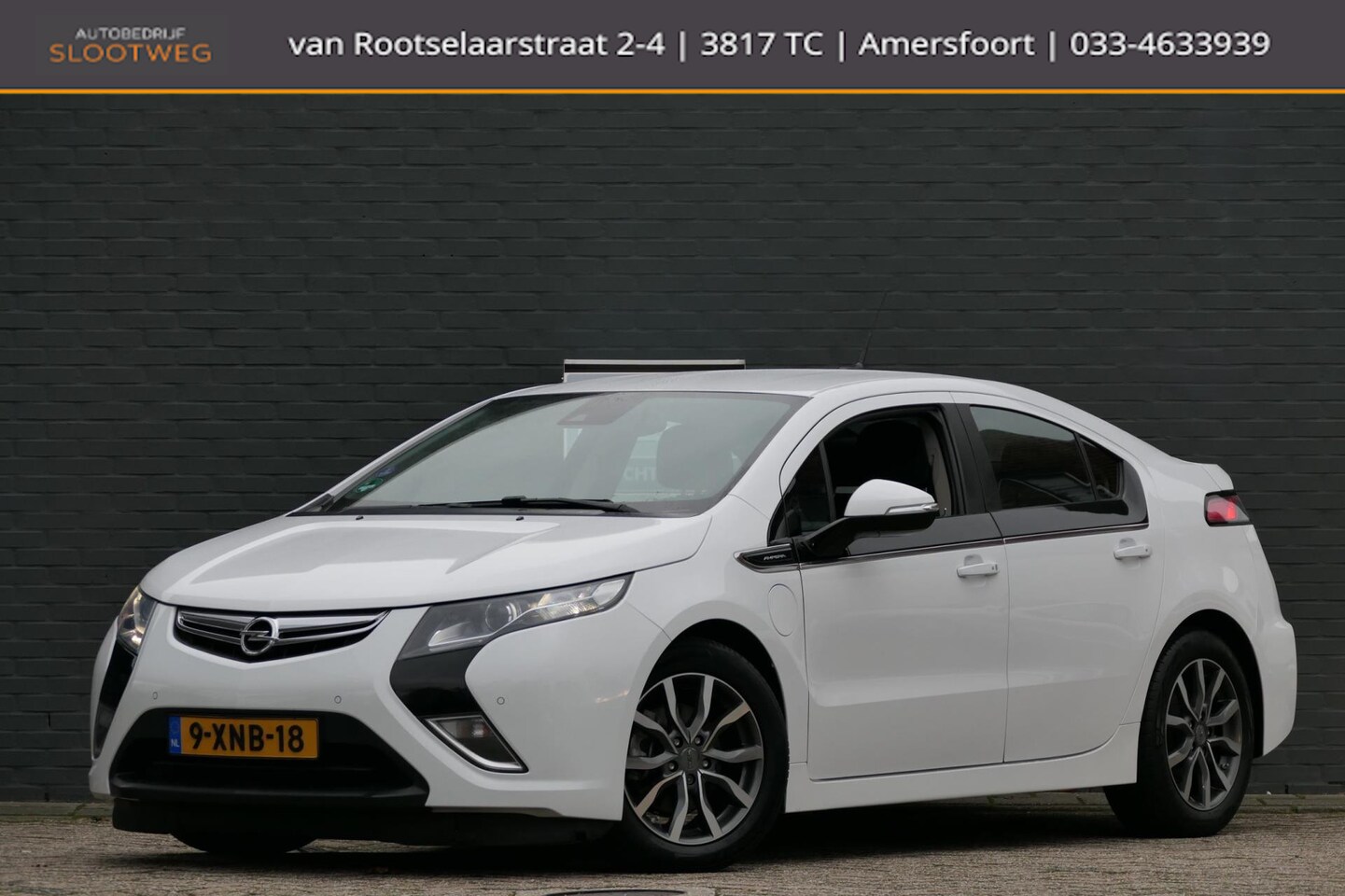 Opel Ampera - 1.4 Plug-In Hybrid Bose | Navi | Camera | Xenon | PDC - AutoWereld.nl