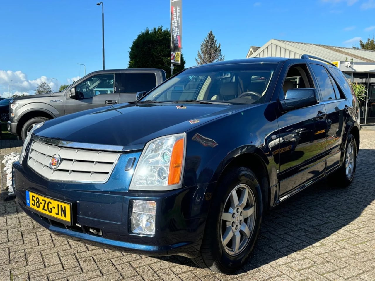 Cadillac SRX - 3.6 Elegance Benzine 2WD Youngtimer NL Auto - AutoWereld.nl