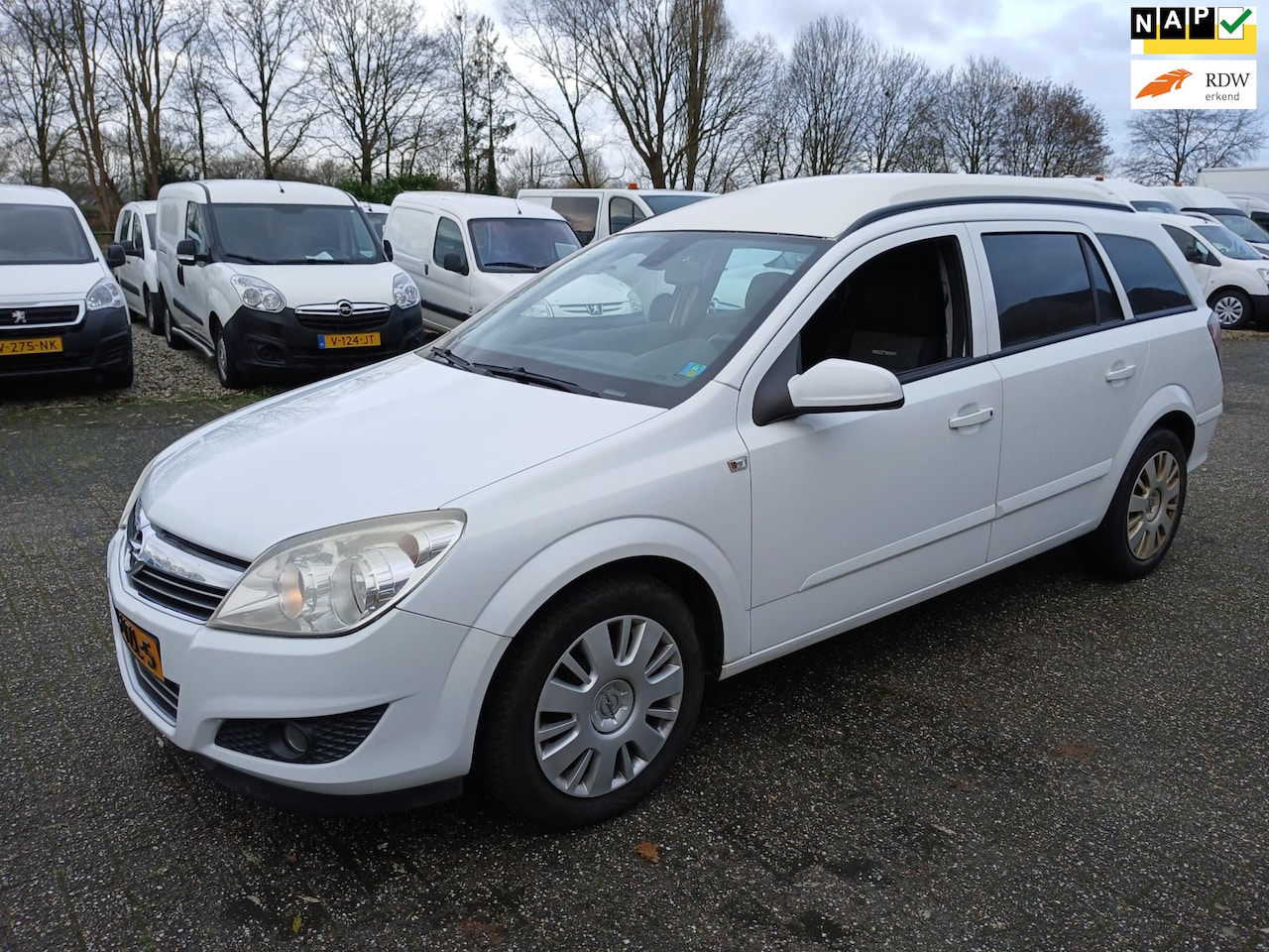 Opel Astra - 1.7 CDTi Enjoy airco cruise navi pdc - AutoWereld.nl