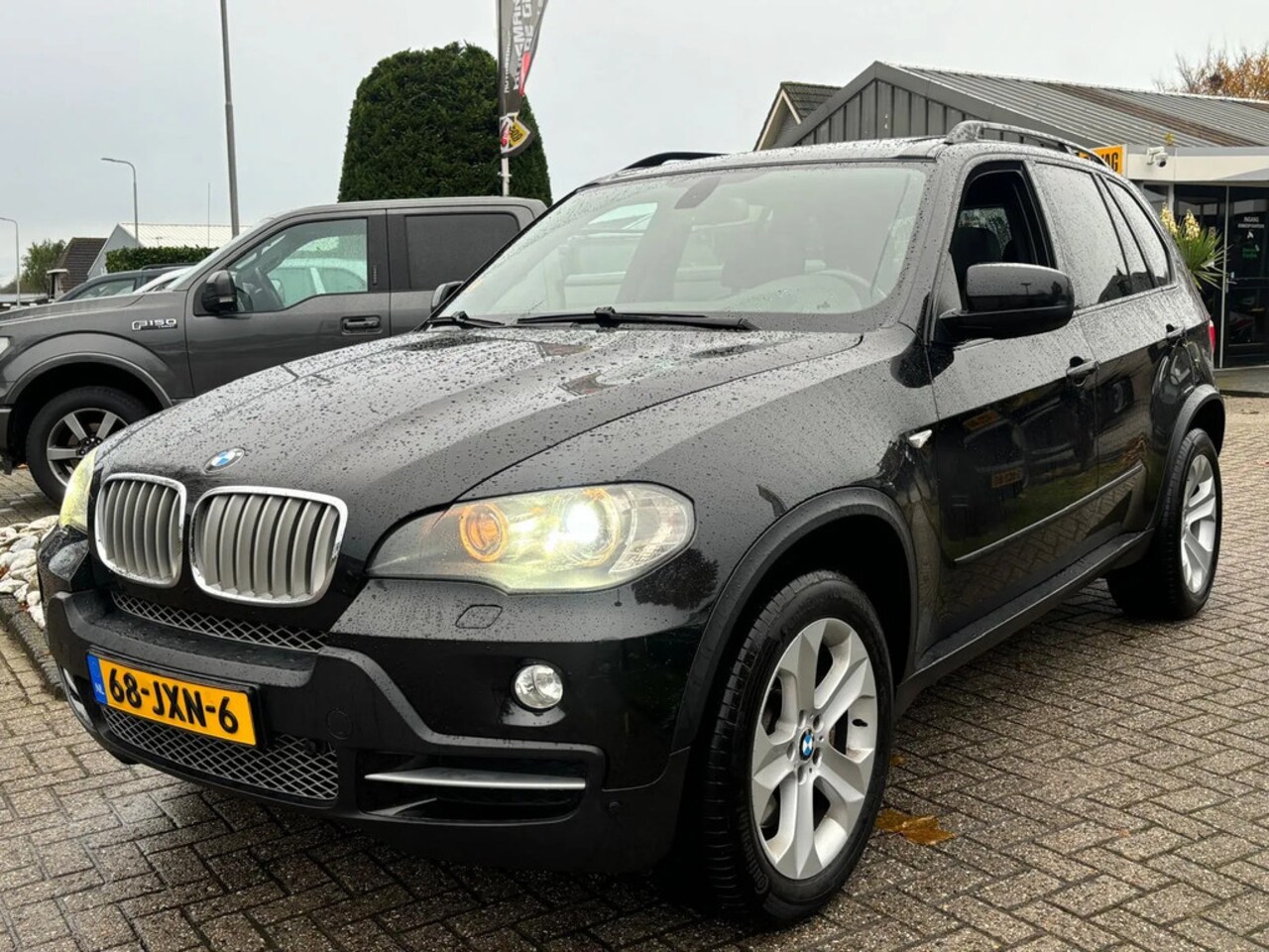 BMW X5 - 3.5D 286PK High Exe Zwart 2009 Panorama Youngtimer - AutoWereld.nl