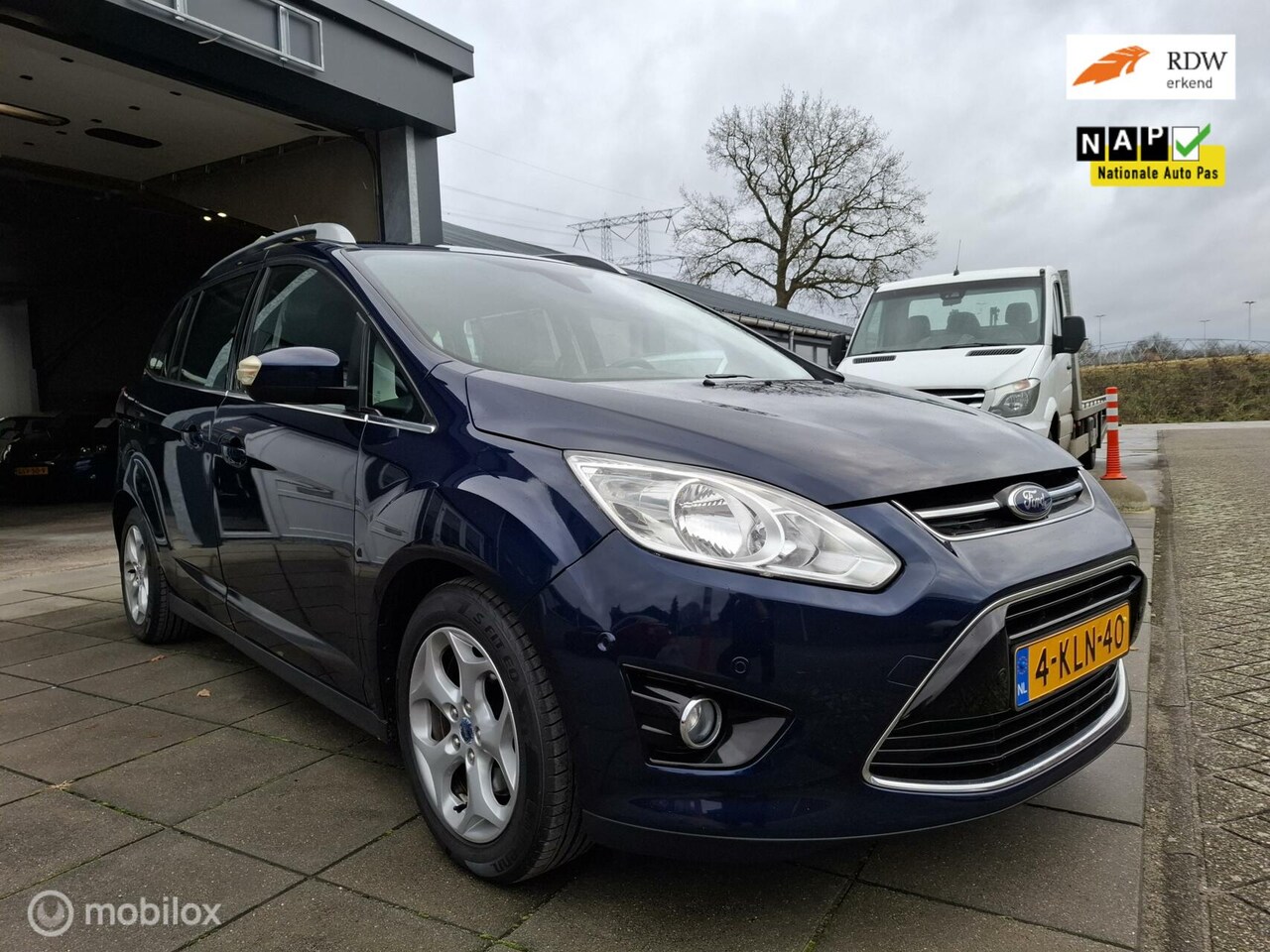 Ford Grand C-Max - 1.0 Lease Titanium/clima/navi/trekhaak - AutoWereld.nl