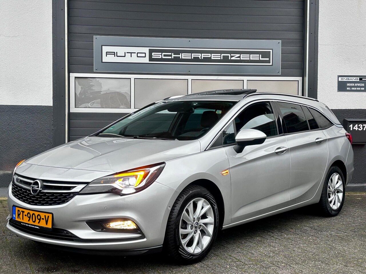 Opel Astra Sports Tourer - 1.0 Innovation I OPEN DAK I NAVI I CAMERA I NL - AutoWereld.nl