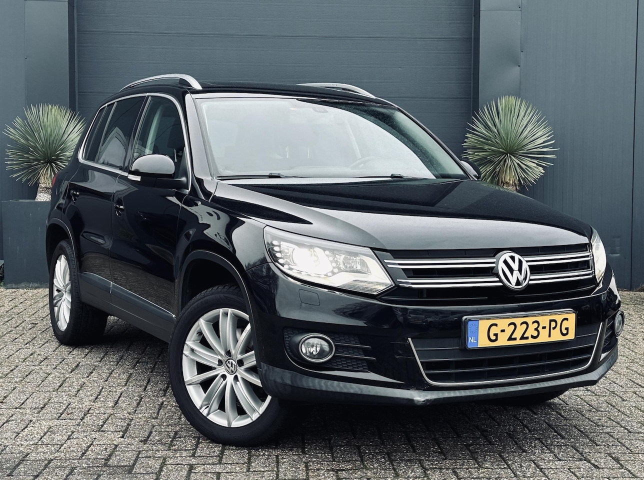 Volkswagen Tiguan - 2.0 TSI Sport&Style 4Motion - AutoWereld.nl