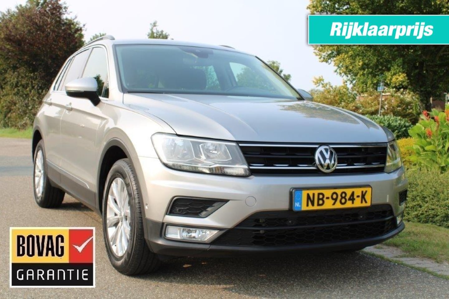 Volkswagen Tiguan - 1.4 TSI 125pk Comfortline ECC/Cruise/Navi/PDC/Camera/Trekhaak - AutoWereld.nl